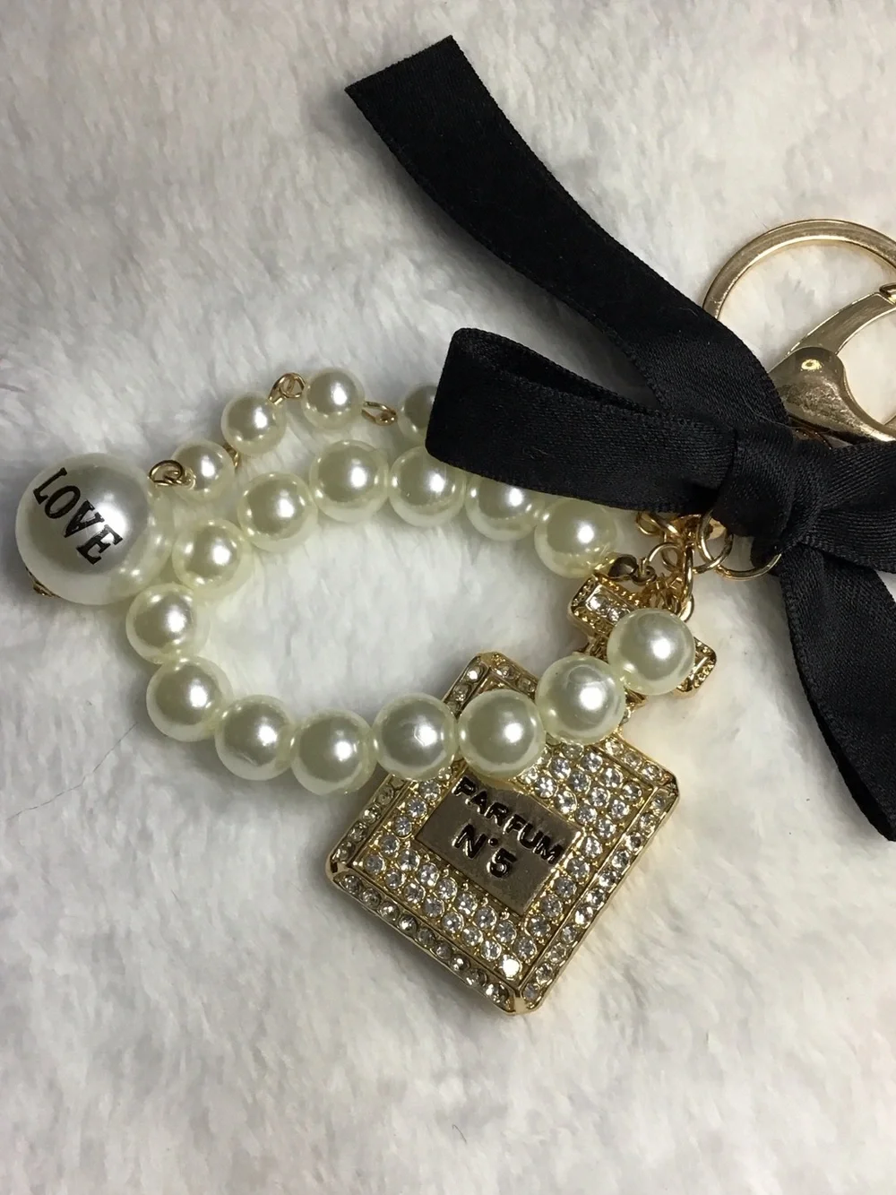 Pearl and Gold Perfume Bottle Keychain with Black Ribbon